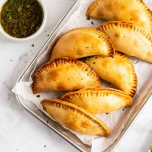 Empanadas are popular in Argentina, they are a staple of everyday life. Made with a variety of fillings, including beef, chicken, cheese, and vegetables.